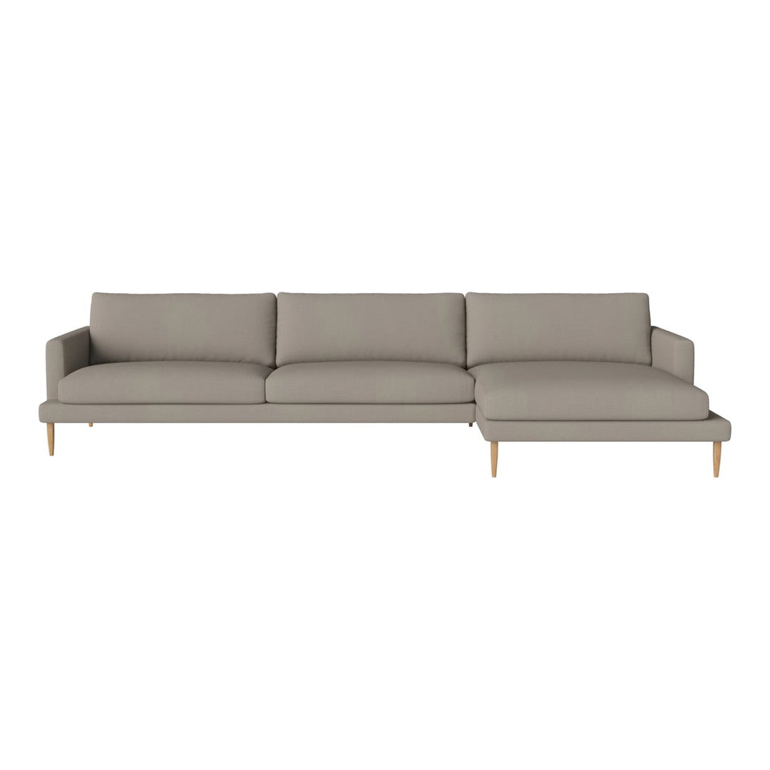 Light gray modern sectional sofa with clean lines and wooden legs, perfect for contemporary living spaces.