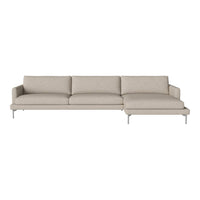 Light beige sectional sofa with a smooth, clean fabric and sleek metal legs. Modern design for stylish living spaces.