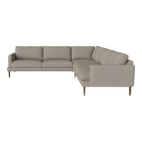 Light gray sectional sofa with clean lines and soft fabric, featuring a modern design and wooden legs.