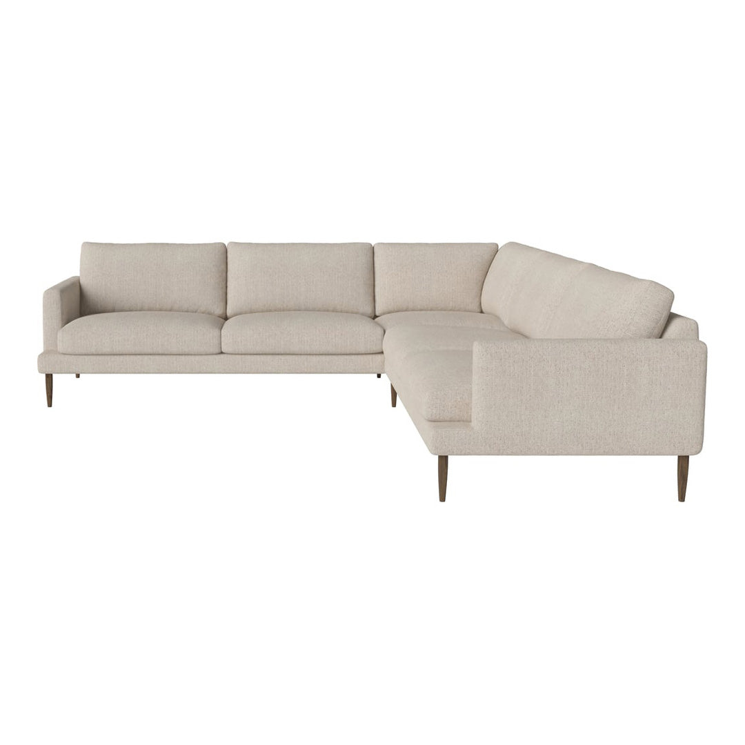 Neutral beige sectional sofa with smooth fabric, featuring modern lines and minimalist design. Perfect for contemporary decor.