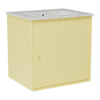 Yellow storage cabinet with a speckled white top, featuring a simple design and a single door.