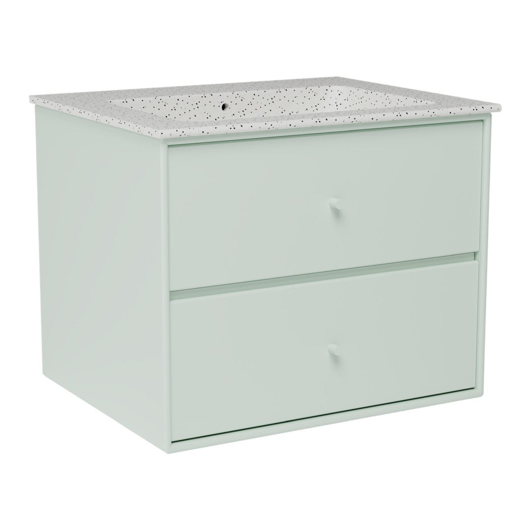 Light green storage cabinet with a speckled white countertop and minimalist design. Ideal for modern decor.