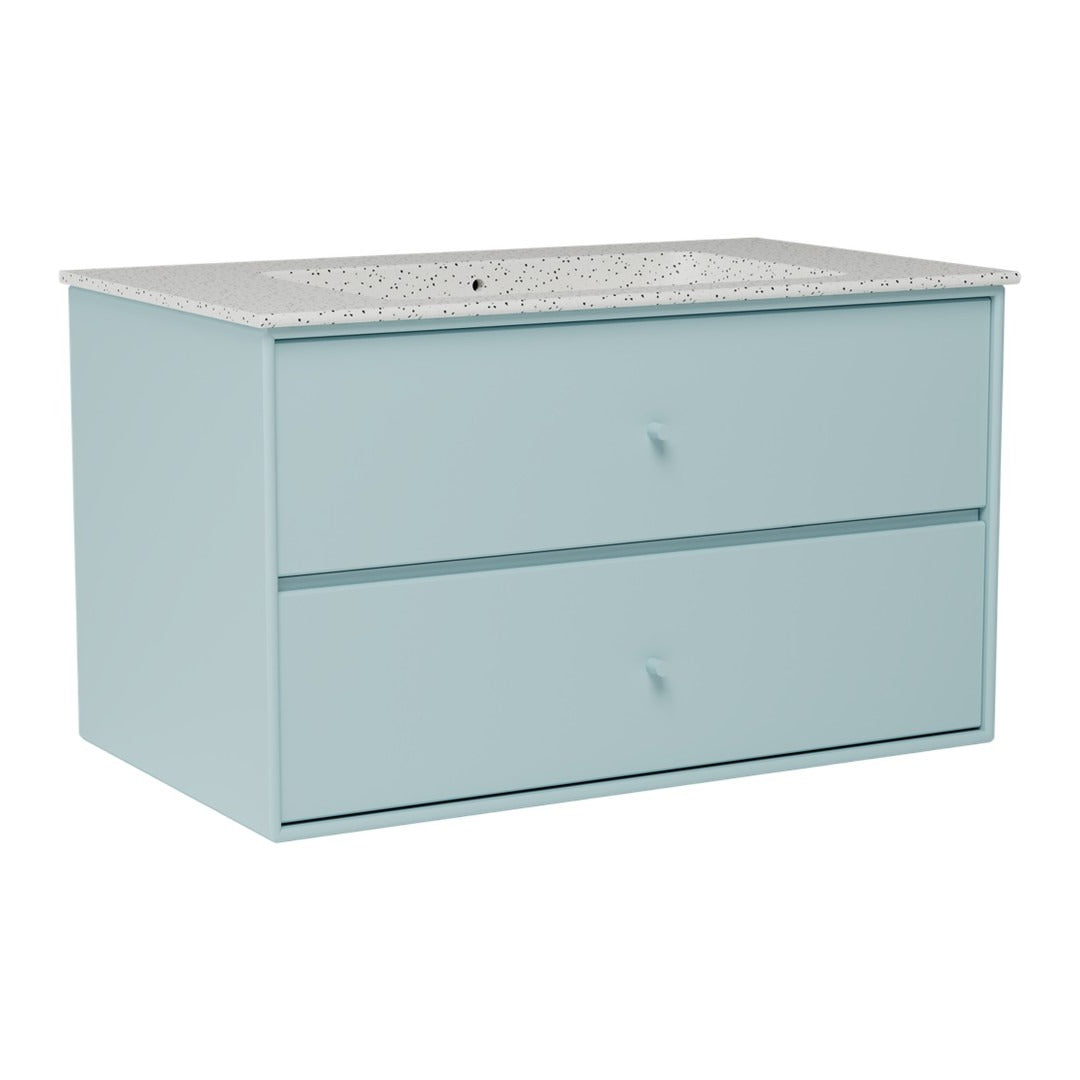 Light blue vanity with a speckled gray countertop and two spacious drawers. Modern and stylish design for any bathroom.