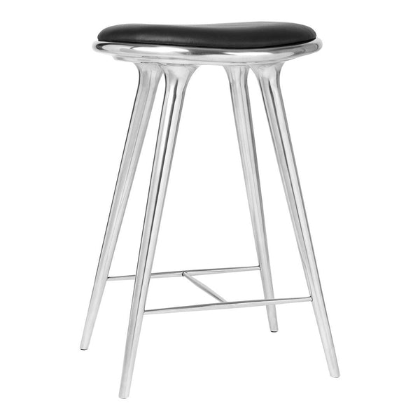 Black and silver modern bar stool with sleek contours and a minimalist design. Perfect for any contemporary space.