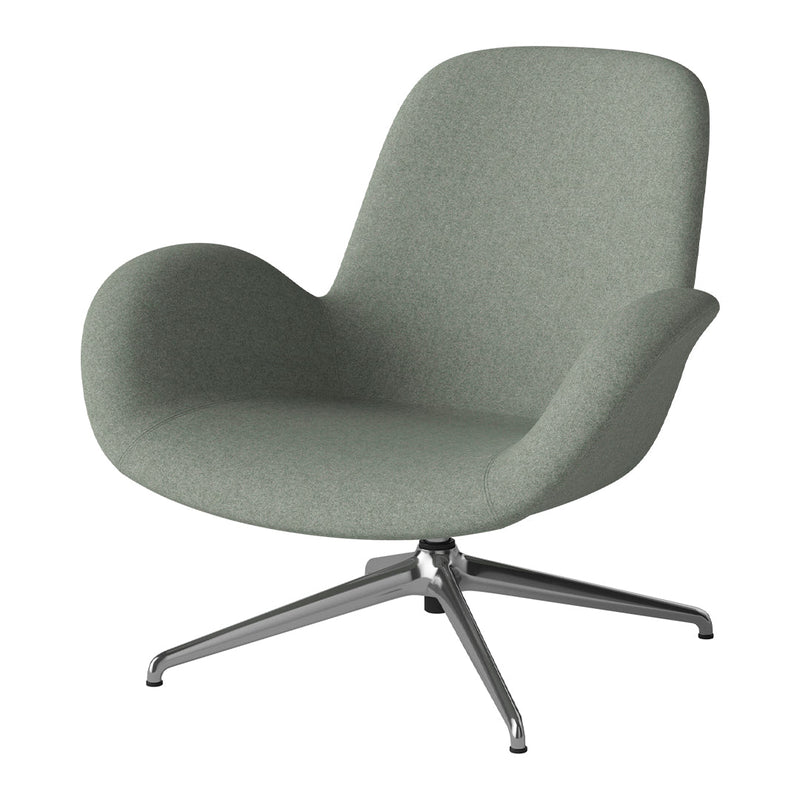 Soft green upholstered chair with a smooth, minimalist design and a sleek silver base. Perfect for modern interiors.