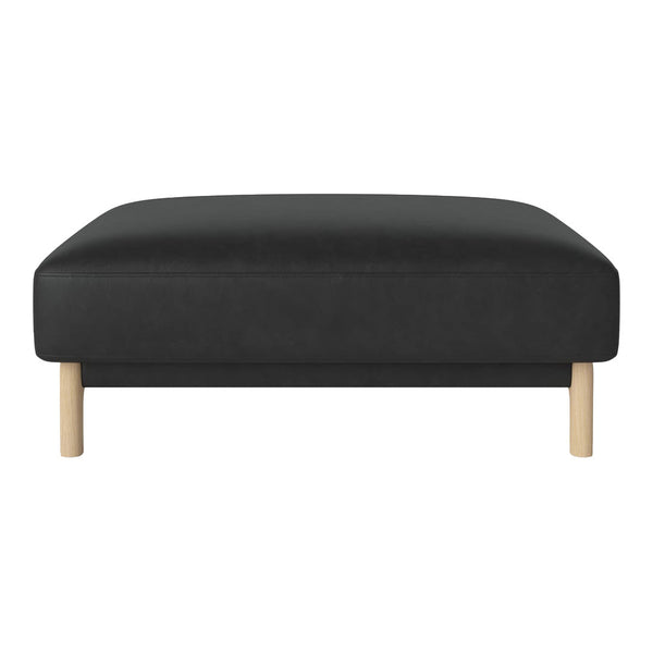 Black upholstered ottoman with natural wooden legs, featuring a sleek, minimalist design.