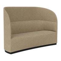 Curved beige upholstered sofa with sleek, modern design and subtle texture, featuring a contrasting black base.