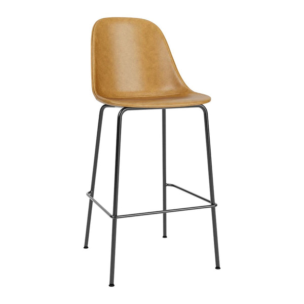 Tan faux leather bar stool with sleek black metal legs, offering a modern and minimalist design.