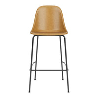Tan bar stool with a smooth finish and sleek black metal legs, perfect for modern decor.