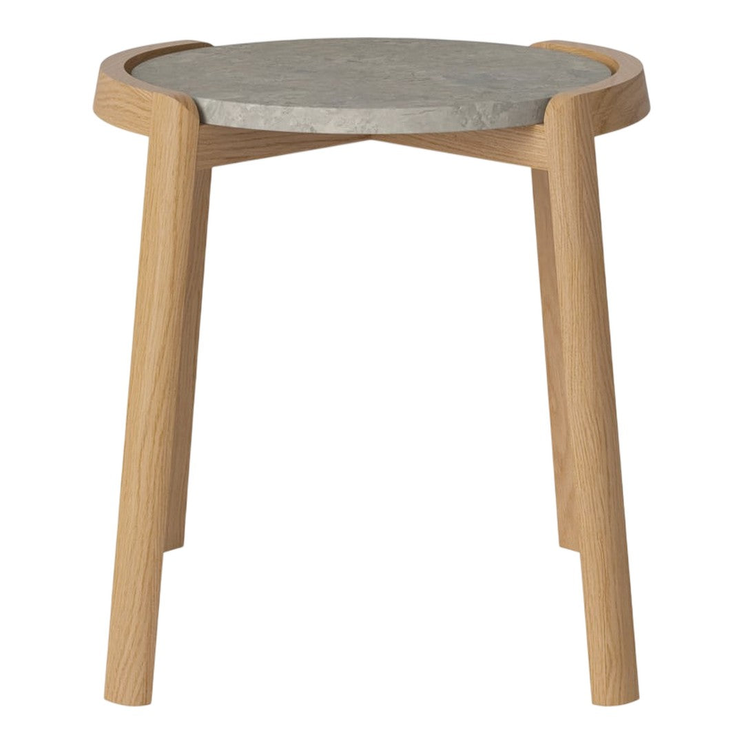 Natural wood table with a sleek gray concrete top and minimalist design, featuring light wood legs and curved edges.