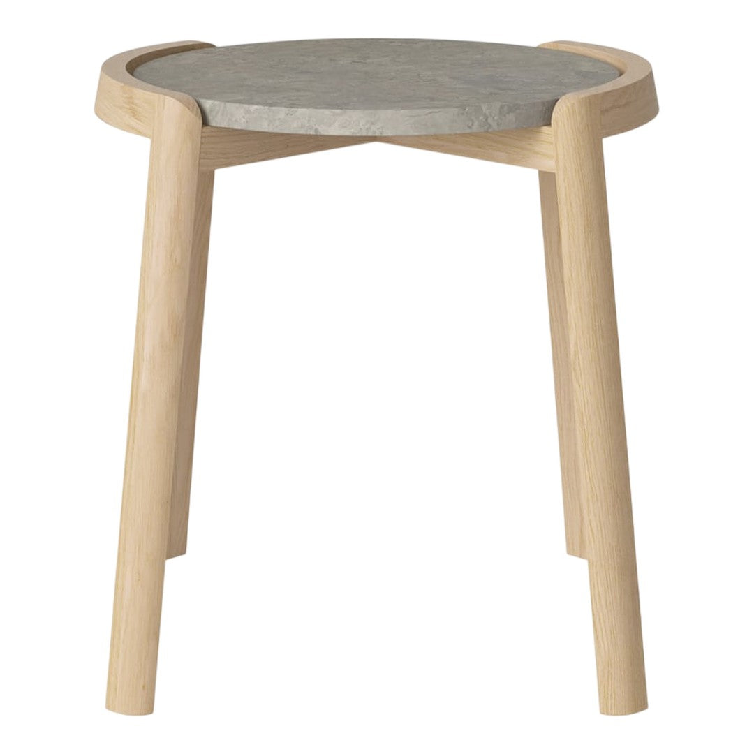 Light wooden legs with a round gray concrete top, featuring a smooth, minimalist design.