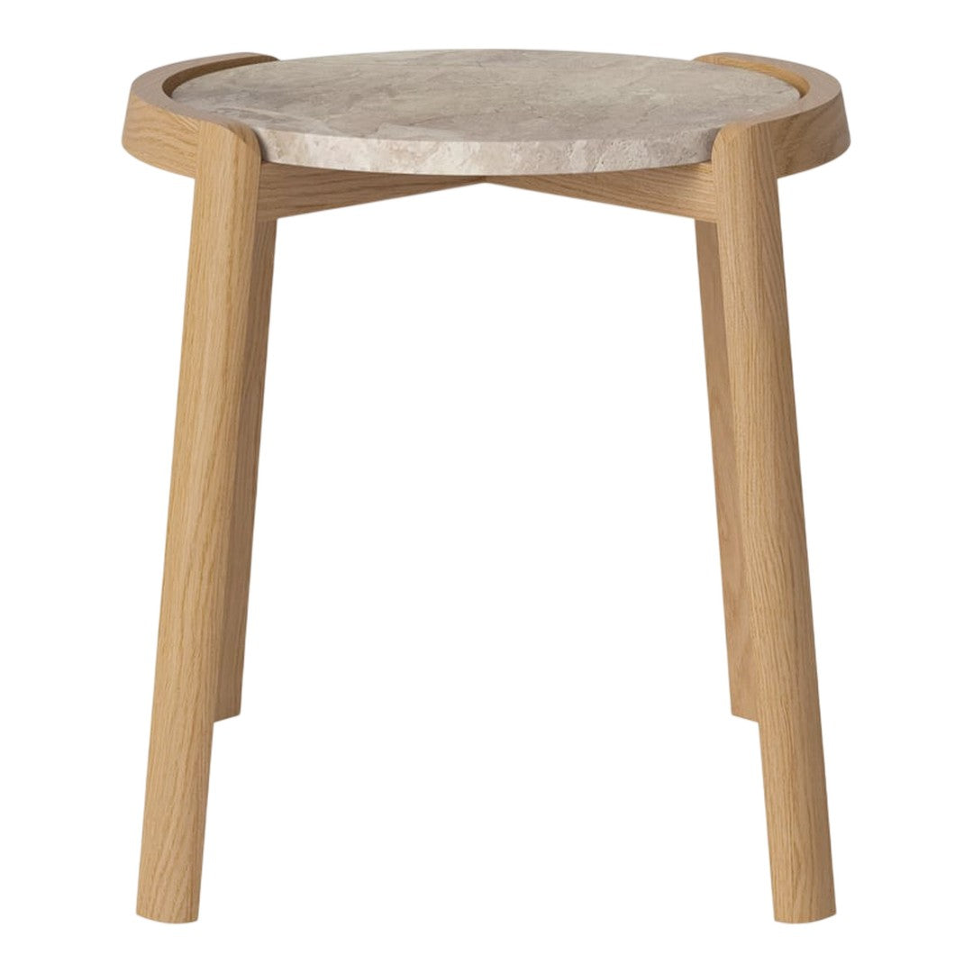 Round side table with a light wooden base and a smooth, pale gray top, showcasing a minimalist design.