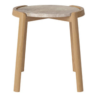 Round side table with a light wooden base and a smooth, pale gray top, showcasing a minimalist design.