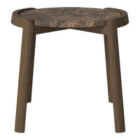 Rustic brown wood side table with a natural finish and unique textured patterns on the top surface.