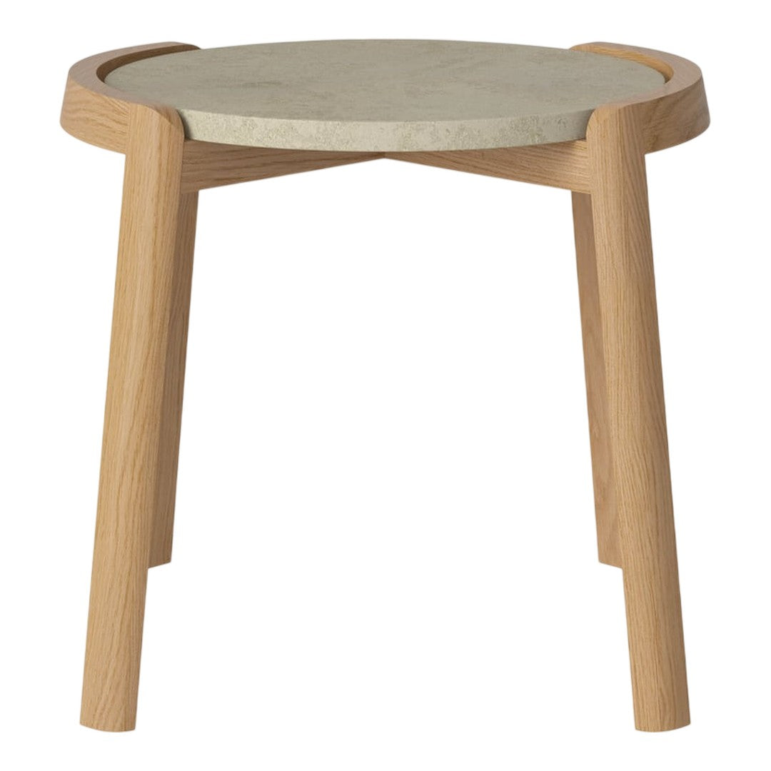 Light wood legs support a round, smooth gray concrete top, showcasing a modern minimalist design.
