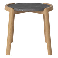 Light wood legs with a sleek, dark gray marble top, featuring subtle veining for a modern, minimalist design.