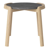 Natural wood legs with a sleek black marble top, featuring a minimalist design and smooth finishes.
