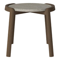 Round side table with a concrete top and dark wood legs, showcasing a modern, minimalist design.