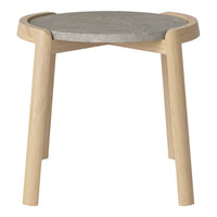 Natural wood legs with a round gray stone top, featuring a smooth, minimalist design. Perfect for modern decor.