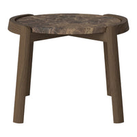 Round wooden side table with a natural brown finish and unique grain pattern. Perfect for rustic decor.