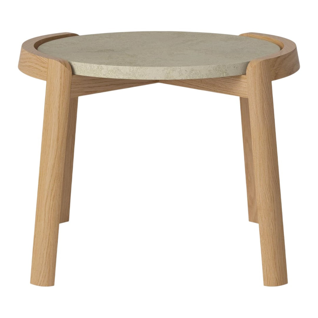 Light wood legs with a round, grey stone top. Minimalist design with natural textures and soft hues.