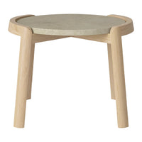 Light wooden legs with a round, smooth gray cement top in a minimalist design. Ideal for modern decor.