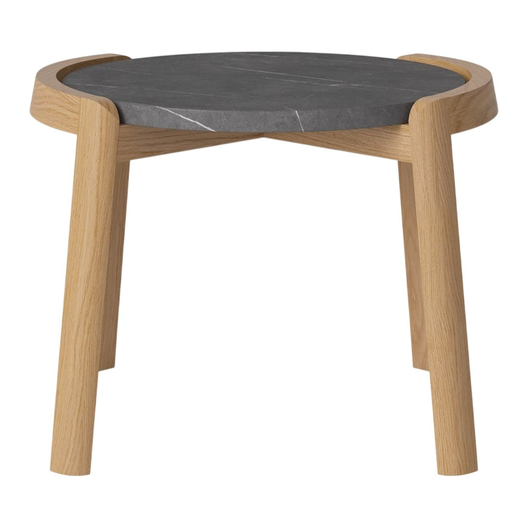 Round black marble table top with natural wood legs, featuring smooth edges and a modern design.