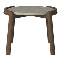 Round side table with a gray concrete top and rich brown wooden legs, featuring a modern, minimalist design.