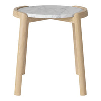Natural wood legs with a round white marble top, featuring subtle gray veining for a modern look.