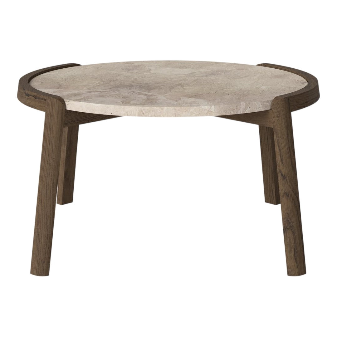 Round coffee table with a textured beige marble top and dark wood legs, featuring a minimalist design.