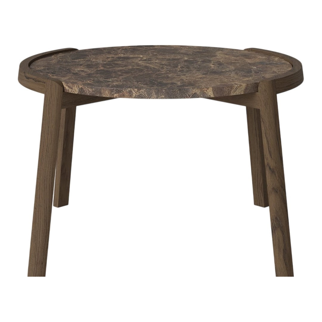 Round wooden table with a dark wood finish and natural, textured stone-like pattern on the tabletop.