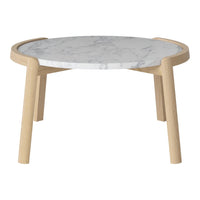 Round coffee table with a white marble top and natural wood legs, featuring a smooth, minimalist design.