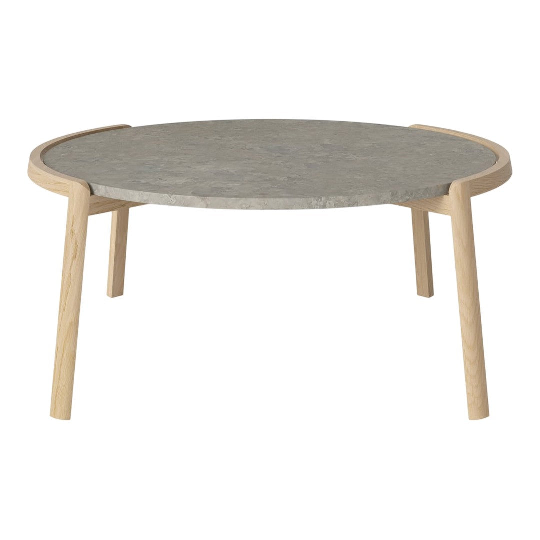 Round coffee table with a gray stone top and natural wood legs, featuring a sleek, minimalist design.