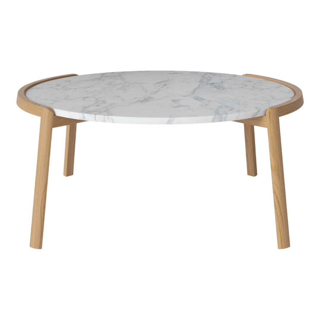 Round coffee table with a white marble top and natural wood legs, featuring a sleek and modern design.
