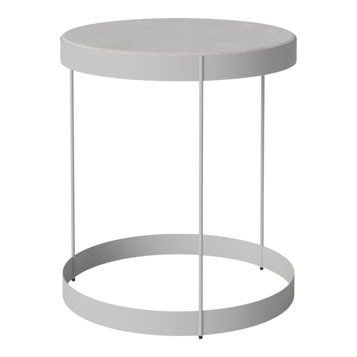 Round gray side table with a sleek metal base and minimalist design, perfect for modern decor.