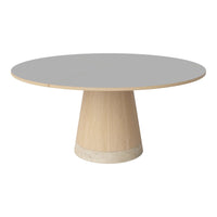 Round table with a sleek gray top and natural wood base, showcasing modern minimalism and simple elegance.