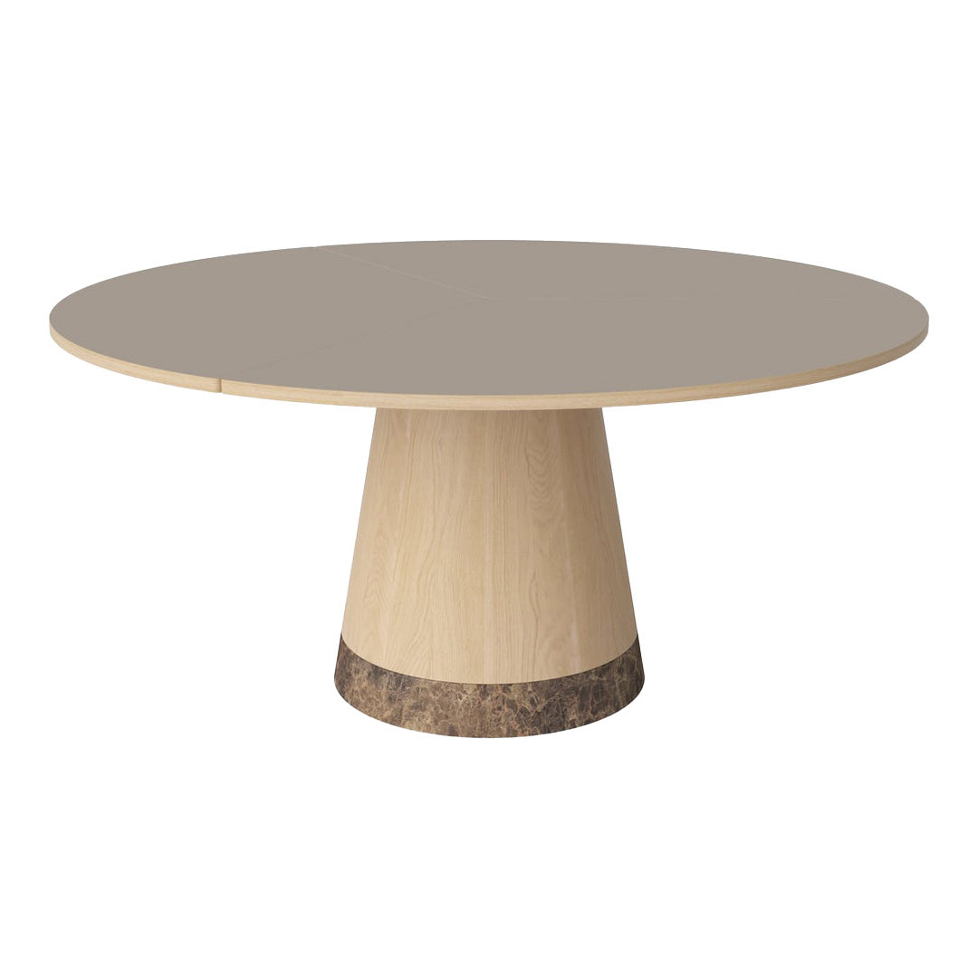 Round beige table with a smooth gray top and a wooden base featuring a dark marble accent. Minimalist design.