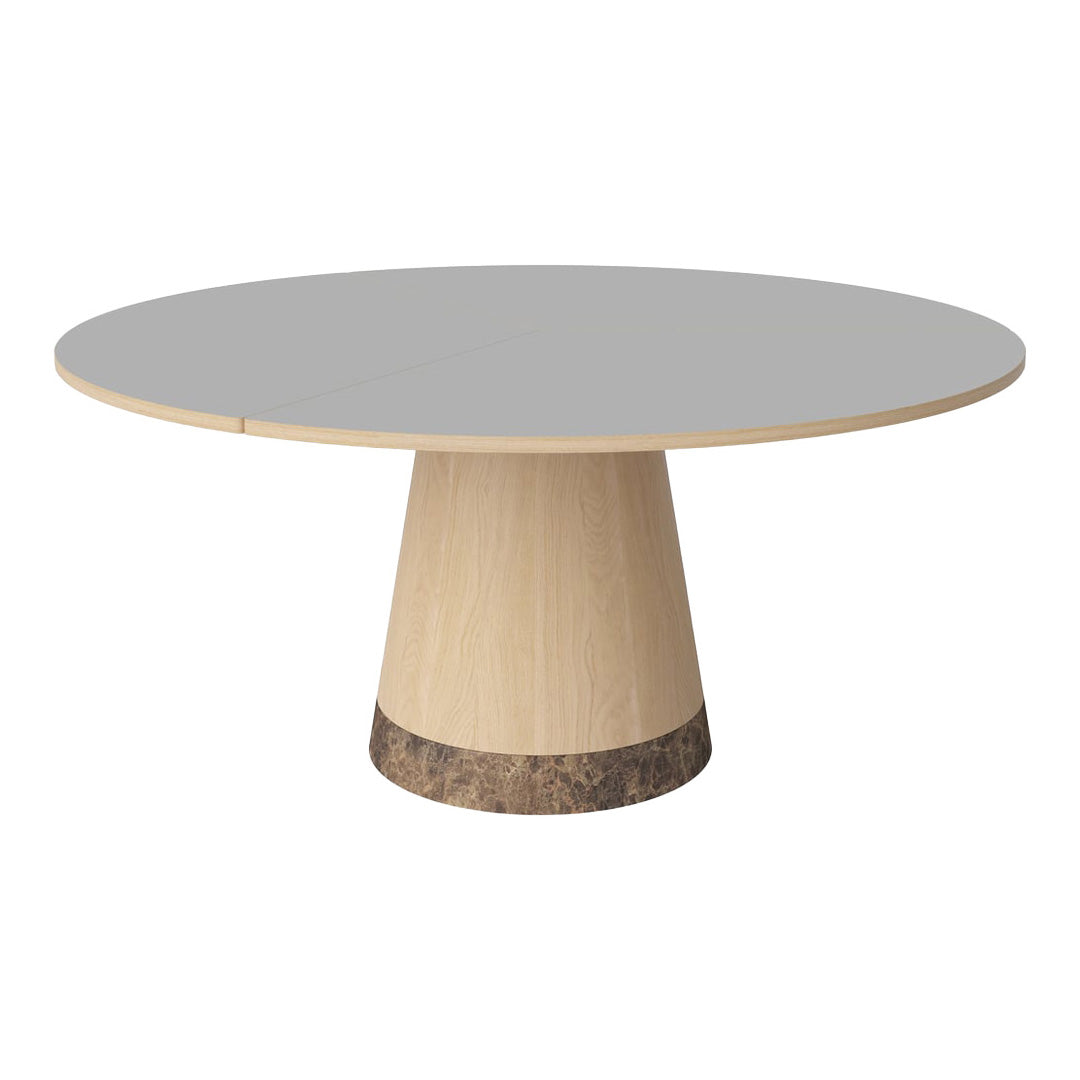 Round table featuring a sleek gray top and a natural wood base with a textured dark stone accent. Modern and stylish design.