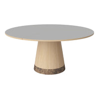 Round table featuring a sleek gray top and a natural wood base with a textured dark stone accent. Modern and stylish design.