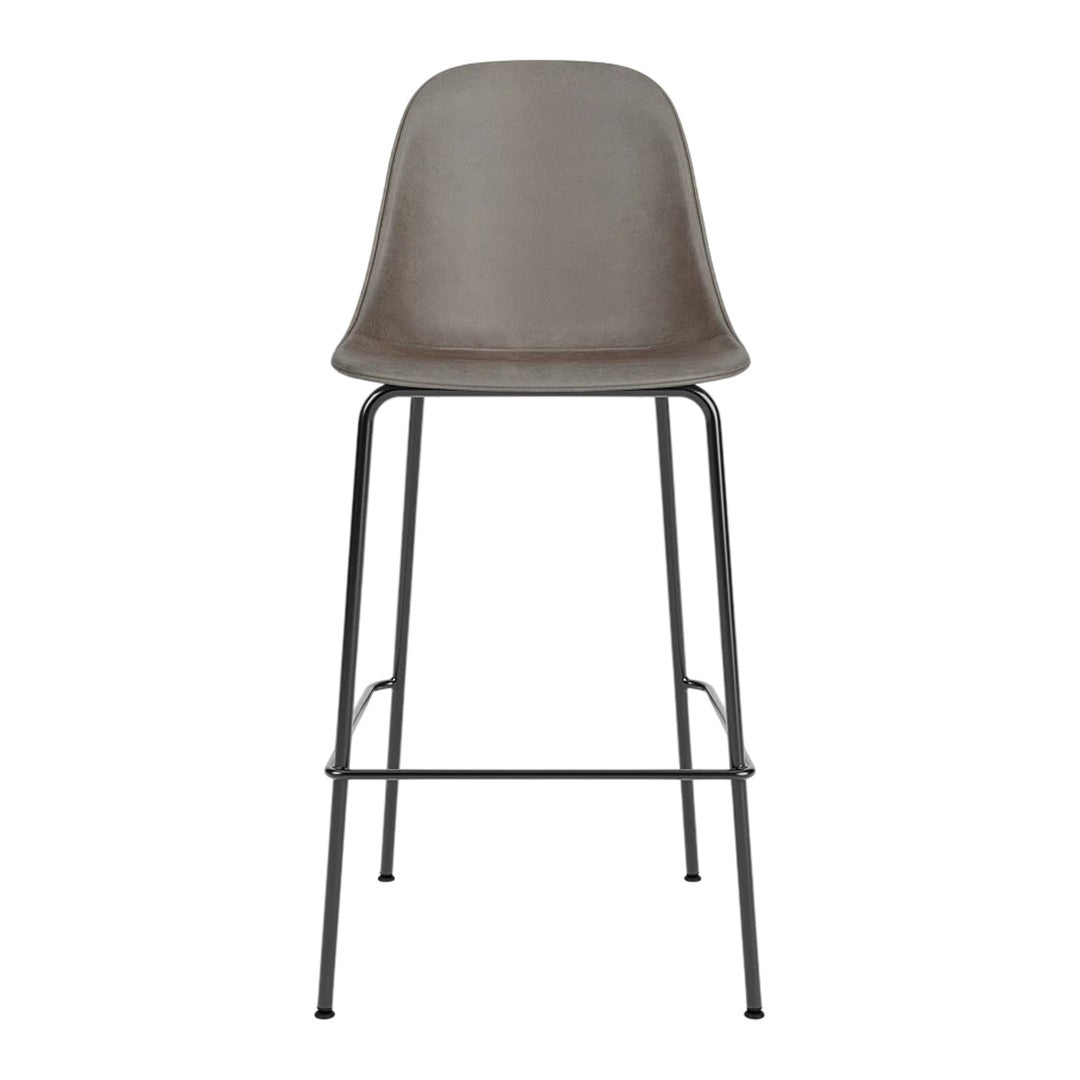 Gray upholstered barstool with a smooth finish and sleek black metal legs, perfect for modern decor.