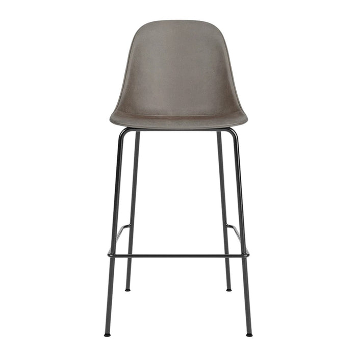 Gray upholstered barstool with a smooth finish and sleek black metal legs, perfect for modern decor.