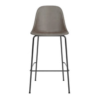 Stylish gray bar stool with a smooth, minimalist design and sleek black metal legs. Perfect for modern decor.