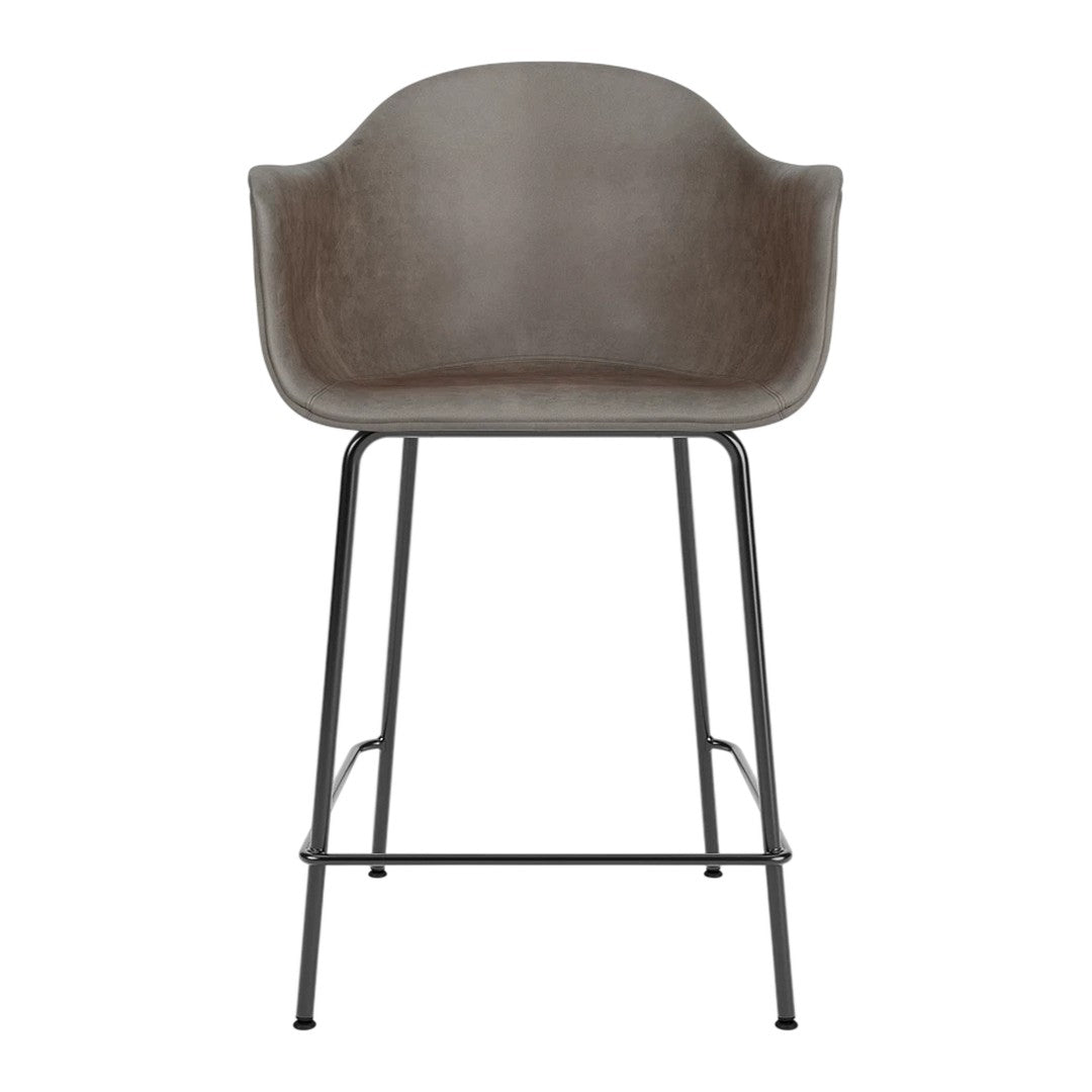 Gray upholstered stool with a sleek black metal frame and minimalist design. Perfect for modern interiors.