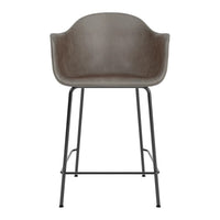 Gray upholstered stool with a sleek black metal frame and minimalist design. Perfect for modern interiors.