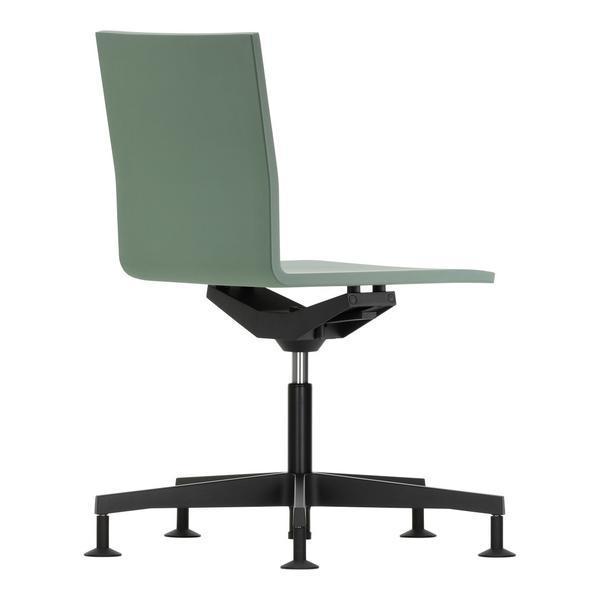 Green ergonomic chair with a sleek design and black base, featuring a modern, minimalistic aesthetic.