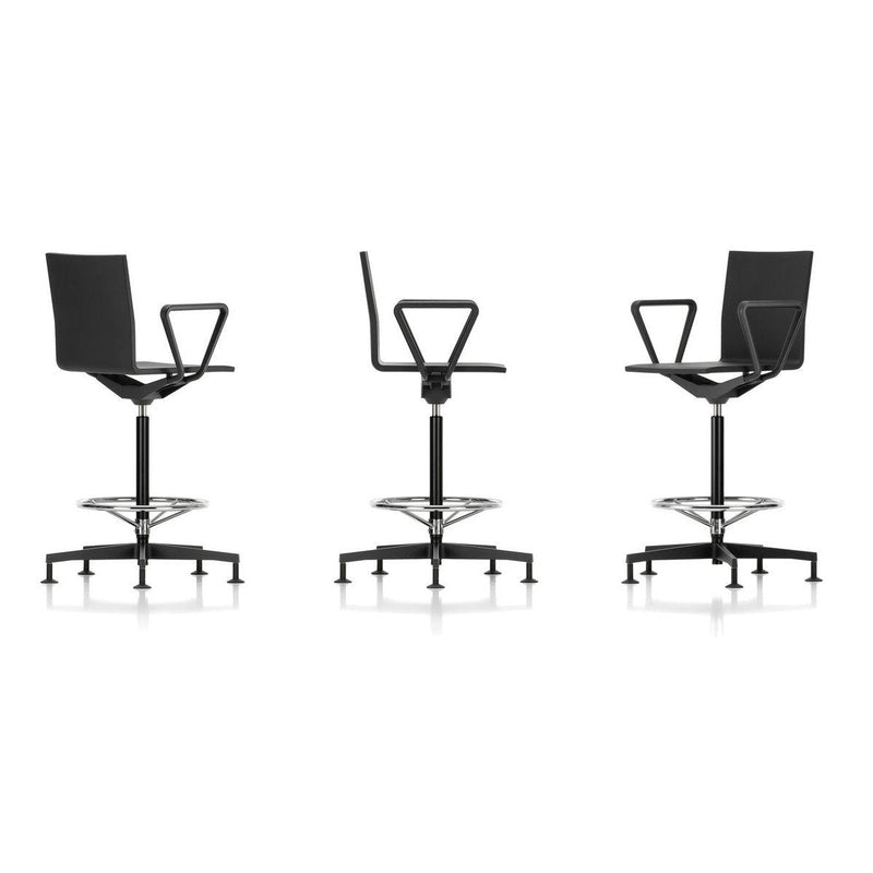 Modern black swivel stool with minimalist design and sleek chrome base, showcasing a contemporary and stylish aesthetic.