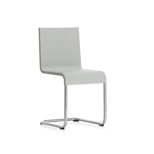 Modern gray chair with a sleek design and a smooth, solid pattern, featuring a chrome base for a contemporary look.