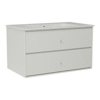 Light grey dresser with a textured white countertop and simple drawer design, perfect for modern decor.