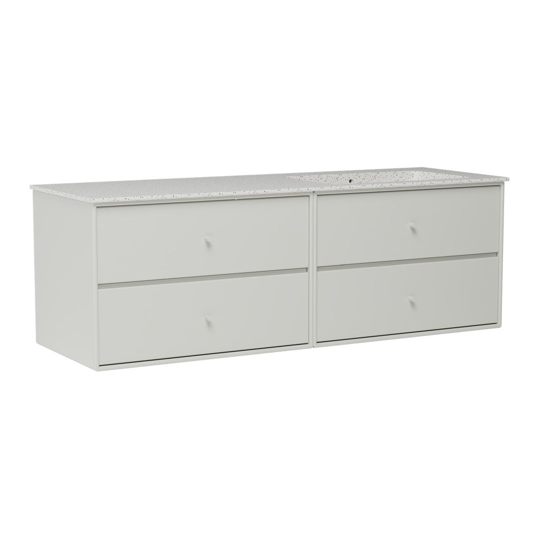 Light gray dresser with a smooth finish and four spacious drawers, featuring minimalist design and subtle knob accents.