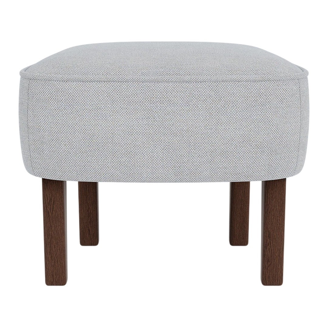 Light gray upholstered ottoman with simple, clean lines and sleek wooden legs. Ideal for modern decor.